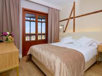 Postel nebo postele na pokoji v ubytování Hotel Boutique ADOLFO