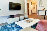 Televízia a/alebo spoločenská miestnosť v ubytovaní Mojito Apartments - Botanica II