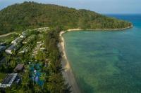 an aerial view of a beach with a resort at Rosewood Phuket in Patong Beach