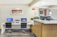 a waiting room at a hospital with two computers at Anaheim Desert Inn & Suites in Anaheim