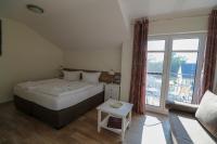 Postel nebo postele na pokoji v ubytování Usedom Bike Hotel & Suites