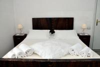 A bed or beds in a room at Shabby House Nonna Peppa