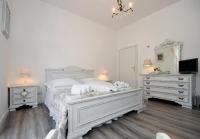 A bed or beds in a room at Shabby House Nonna Peppa