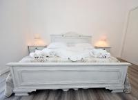 A bed or beds in a room at Shabby House Nonna Peppa