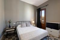 Posteľ alebo postele v izbe v ubytovaní tuGuest Placeta de San Gil Apartments