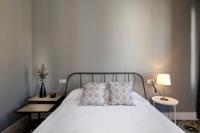 Posteľ alebo postele v izbe v ubytovaní tuGuest Placeta de San Gil Apartments