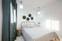 Posteľ alebo postele v izbe v ubytovaní tuGuest Placeta de San Gil Apartments