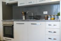 Kuchyňa alebo kuchynka v ubytovaní Apartman Reno