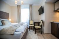 Łóżko lub łóżka w pokoju w obiekcie Villa Baltica