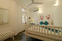 Een bed of bedden in een kamer bij Fort Heaven - Galle Fort