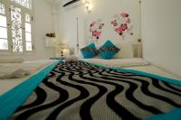 Een bed of bedden in een kamer bij Fort Heaven - Galle Fort