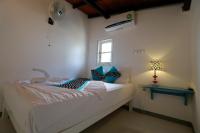 Een bed of bedden in een kamer bij Fort Heaven - Galle Fort