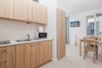 Kuchnia lub aneks kuchenny w obiekcie Apartamenty Aquamarina by Noclegi Renters