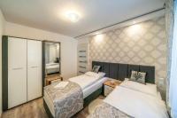 Postel nebo postele na pokoji v ubytování Apartament Glamour