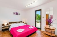Postel nebo postele na pokoji v ubytování Two-Bedroom Apartment Crikvenica near Sea 12