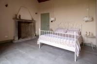 Posteľ alebo postele v izbe v ubytovaní B&B Dimora De Roteris