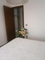A bed or beds in a room at Andrea