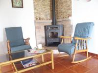 Posezení v ubytování Rural El Puerto Mayordomo