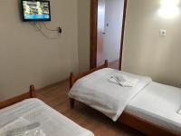 Postel nebo postele na pokoji v ubytování KOÇAN OTEL Hatice Karakoçan