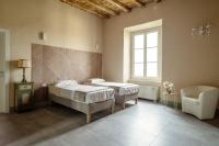 Posteľ alebo postele v izbe v ubytovaní B&B Dimora De Roteris