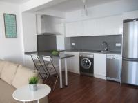 Kuchyň nebo kuchyňský kout v ubytování Life Apartments Fuentebravía