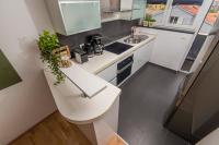 Kuchyň nebo kuchyňský kout v ubytování Apartment Lita Center