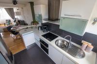 Kuchyň nebo kuchyňský kout v ubytování Apartment Lita Center