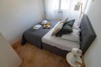 Postel nebo postele na pokoji v ubytování Apartment Lita Center