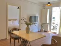 Postel nebo postele na pokoji v ubytování Joy Suites