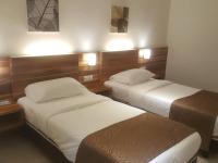 Gold Boutique Hotelにあるベッド