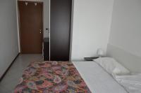 A bed or beds in a room at Bed & Breakfast Cesarina