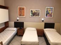 A bed or beds in a room at B&B Primerano SP73