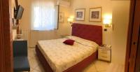 A bed or beds in a room at B&B Primerano SP73