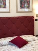 A bed or beds in a room at B&B Primerano SP73