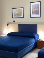 A bed or beds in a room at B&B Primerano SP73