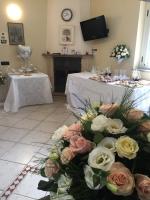A television and/or entertainment centre at B&B Primerano SP73