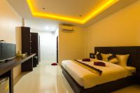 Sleep In Lanta Resortにあるベッド