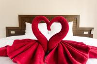 Sleep In Lanta Resortにあるベッド