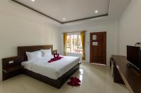 Sleep In Lanta Resortにあるベッド