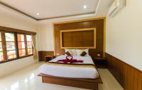 Sleep In Lanta Resortにあるベッド