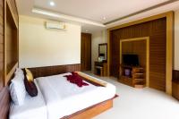 Sleep In Lanta Resortにあるベッド