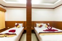 Sleep In Lanta Resortにあるベッド