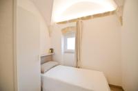Posteľ alebo postele v izbe v ubytovaní Scirocco Apartment with terrace by Wonderful Italy