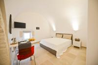 Posteľ alebo postele v izbe v ubytovaní Scirocco Apartment with terrace by Wonderful Italy