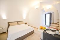 Posteľ alebo postele v izbe v ubytovaní Scirocco Apartment with terrace by Wonderful Italy