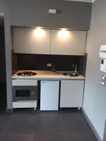 A kitchen or kitchenette at Uniclub House