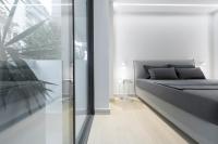 Posteľ alebo postele v izbe v ubytovaní Infinity Sea View Apartment