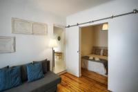 Postel nebo postele na pokoji v ubytování Alfama Historical Apartment 3 BR Duplex
