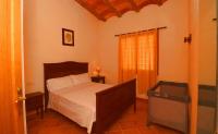 A bed or beds in a room at Can Guillem