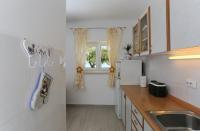 Kuchyňa alebo kuchynka v ubytovaní Holiday Home Lučica